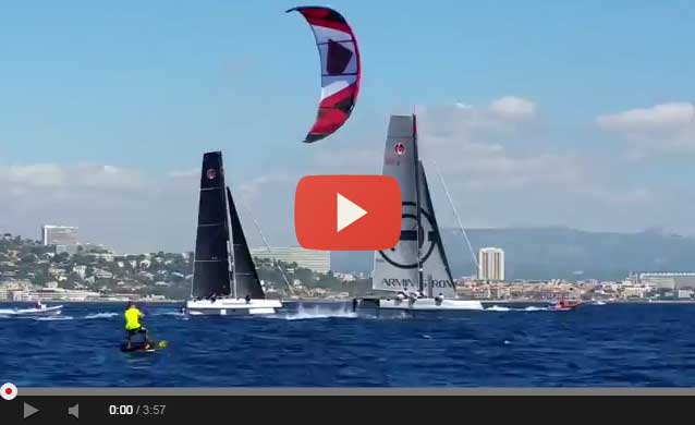 Foiling kiteboard versus the foiling GC32 catamarans