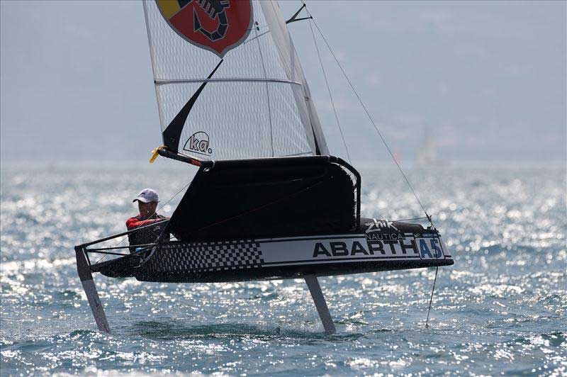 Simon Payne on day 6 of the Zhik Nautica Moth Worlds at Campione del Garda. Photo © Th.Martinez / Sea&Co / www.thmartinez.com